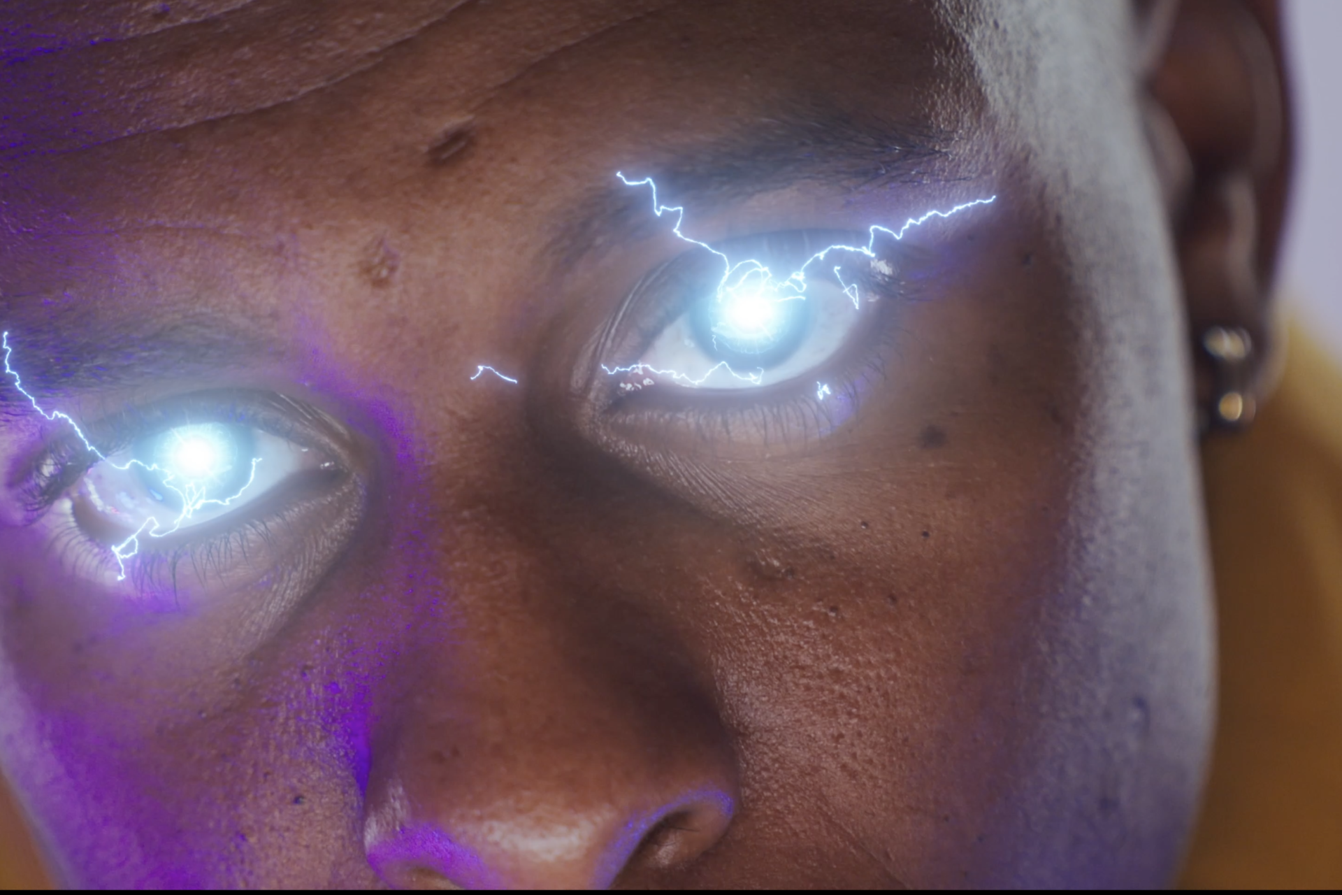 A man with blue eyes and lightning in his eye.